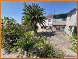 CASA DE PUEBLO CON 2 VIVIENDAS INDEPENDIENTES Y PARCELA DE 260M photo 0