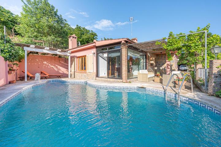 SE VENDE CHALET CON PARCELA EN COÍN photo 0