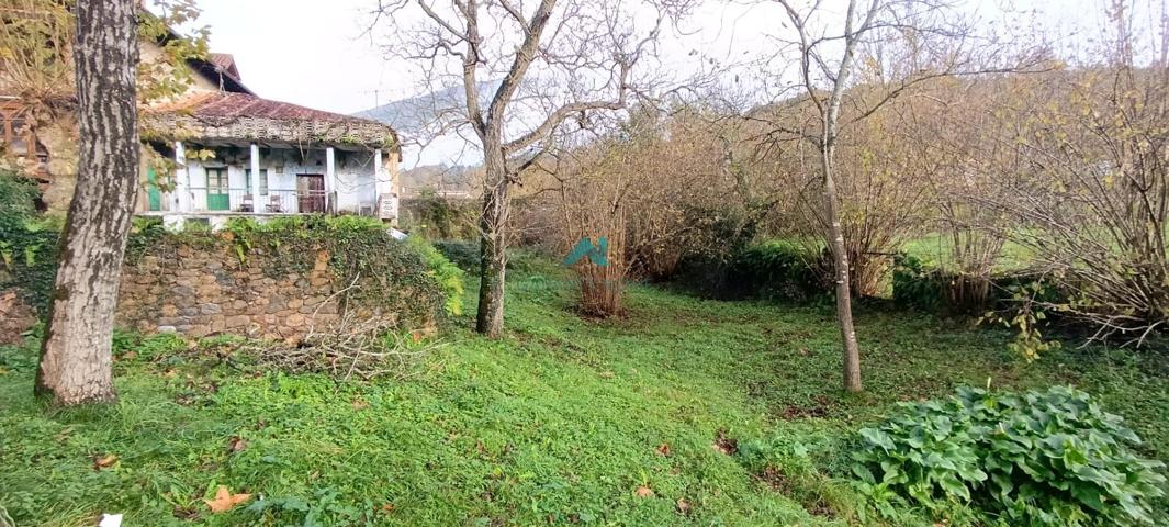 Se vende casa para rehabilitar con terreno en Ruesga photo 0
