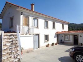 Bonita casa individual de bajo,piso y bajo cubierta reformada en Esmelle(Ferrol) photo 0