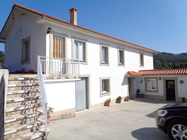 Bonita casa individual de bajo,piso y bajo cubierta reformada en Esmelle(Ferrol) photo 0