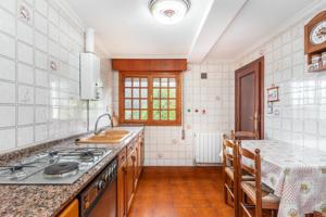 CASA CON TERRENO photo 0