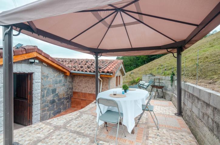 FINCA ÚNICA EN RIOSA | CASA CON TERRAZA, VISTAS Y 15.000 m2 DE TERRENO photo 0