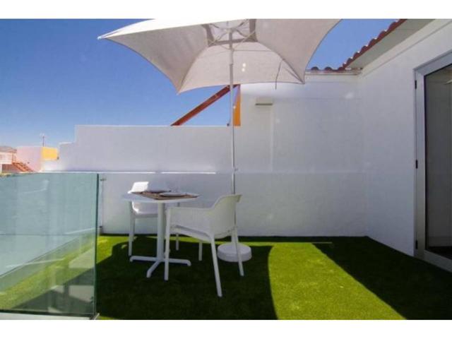 Chalet adosado en venta en Arguineguín photo 0