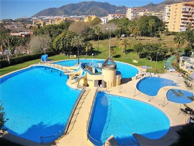 Apartamento completamente reformado en edificio con fabulosos jardines y piscinas con toboganes photo 0