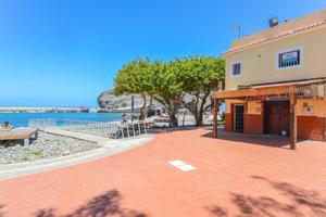 Exclusiva vivienda en primera línea de la playa de dos plantas en la Aldea de San Nicolás photo 0