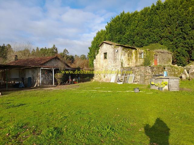 TERRENO DE 2.200 M2 CON DOS CASAS DE PIEDRA A REHABILTAR photo 0