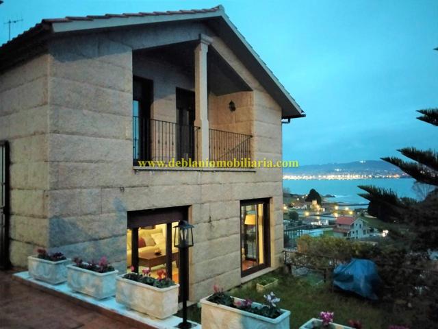 CHALET DE PIEDRA CON ESPECTACULARES VISTAS AL MAR E ISLAS CÍES EN CANGAS photo 0