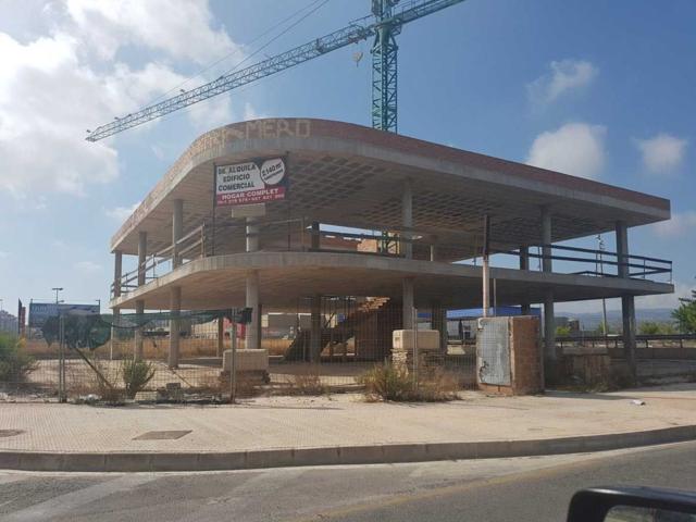 Edificio comercial, todavía en construcción (en fase de estructura) en espacio comercial Carrefour photo 0