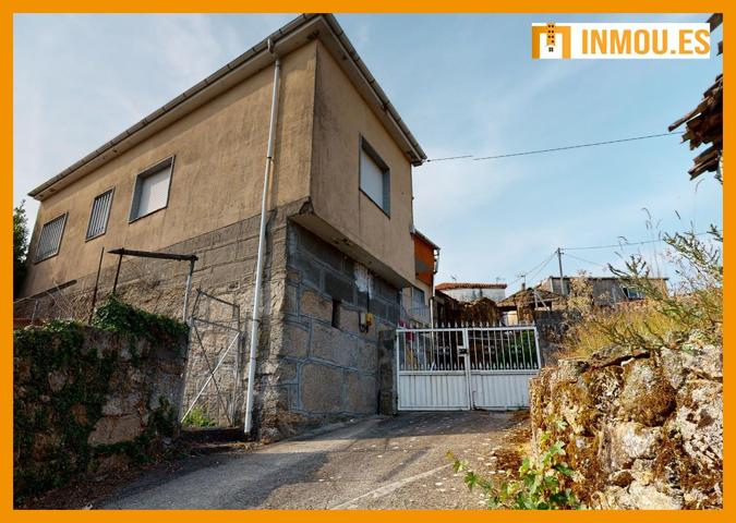 CASA CON TERRENO Y DOS CONSTRUCCIONES DE PIEDRA EN MUIÑOS photo 0