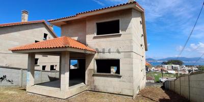Chalet de piedra en Canido con vistas únicas a la ria y para finalizar interiores a gusto del comprador. photo 0