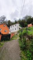 Edificio de dos viviendas en Turón, Asturias: Tu Oportunidad Ideal photo 0