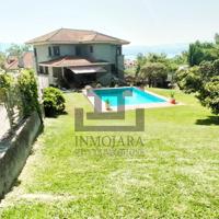 CHALET DE PIEDRA CON PISCINA Y VISTAS AL MAR EN VENTA EN O CON (MOAÑA) photo 0