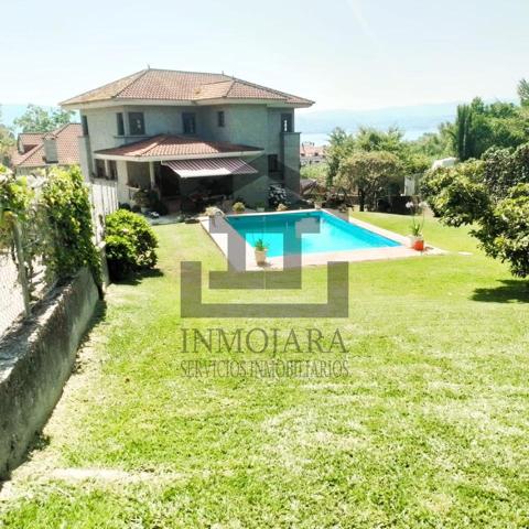 CHALET DE PIEDRA CON PISCINA Y VISTAS AL MAR EN VENTA EN O CON (MOAÑA) photo 0