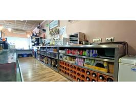Se vende local comercial con negocio en pleno funcionamiento. photo 0