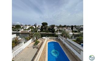 NOGUERA Casa al canal orientación sud-este , terreno de 542m2, piscina y amarre de 12m photo 0