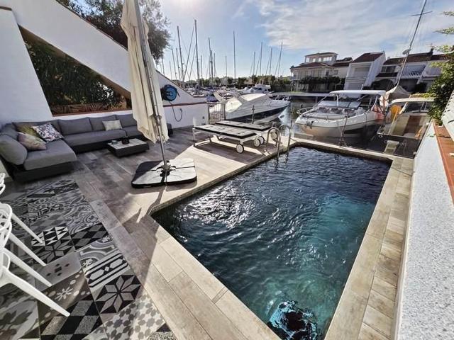 PORT ARGONAUTES Exclusiva casa con amarre privado de 12x4 m, piscina y espectaculares vistas al canal photo 0