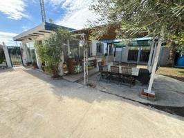 Chalet en venta en Playa de Oliva photo 0