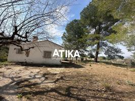 PARCELA RÚSTICA CON RETIRO A LA VENTA EN ONTINYENT photo 0