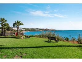 Impresionante casa adosada junto a la playa en venta en un popular desarrollo residencial. photo 0