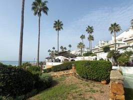 Planta baja de dos dormitorios en Dominion Beach. photo 0