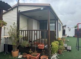 PARCELA 500m2 CON PISCINA Y DOS CASAS PREFABRICADAS photo 0