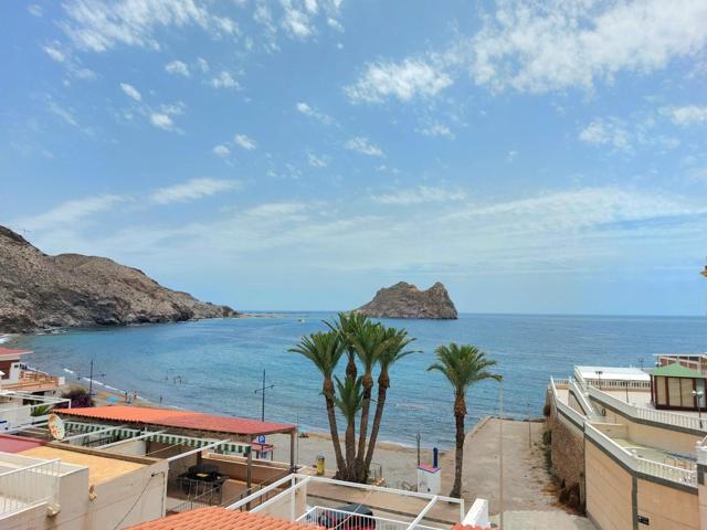 Chalet adosado de dos plantas, junto a la playa del Hornillo con vistas al mar. photo 0