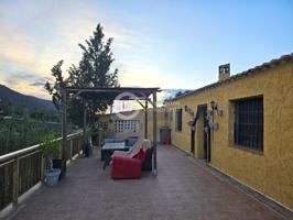 Casa con tres dormitorios y garaje con encanto en Aguaderas photo 0