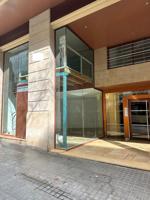 local duplex con grandes ventanales photo 0