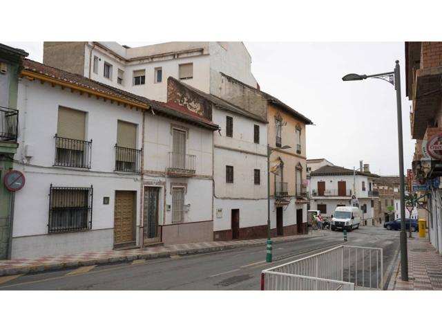 Casa de pueblo en la calle principal de la localidad de Pinos Puente photo 0