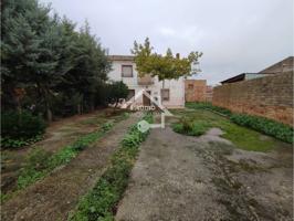 CASA CON TERRENO photo 0