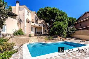 VIVIENDA UNIFAMILIAR DE DISEÑO CON PISCINA PRIVADA EN LA URBANIZACIÓN JARABELTRÁN, VALDEMORILLO (MADRID). photo 0