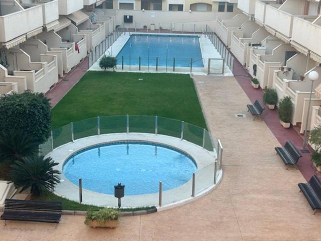 VENTA PISO TOTALMENTE AMUEBLADO EN RESIDENCIAL CON PISCINAS A UN PASO DEL PASEO MARÍTIMO EN LA URBANIZACIÓN DE ROQUETAS photo 0