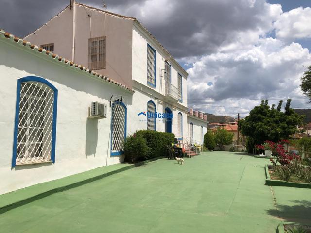 🏡 Gran caserón con parcela en Puerto de la Torre – Oportunidad de inversión única en Málaga photo 0