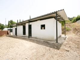 Casa De Campo En venta en Coín photo 0