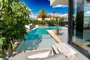Moderno chalet semi-independiente en el Albir, com más de 400m2 con 4 dormitorios, piscina, garaje y espectaculares vistas photo 0