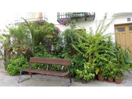 Casa de pueblo situada en una plaza realmente bonita llena de flores y un manantial en el famoso Balneario de Lanjarón. photo 0