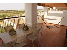 Un paraíso de elegancia y vistas cautivadoras: Exclusiva vivienda terraza con vistas al mar y al campo de golf Alcaidesa photo 0