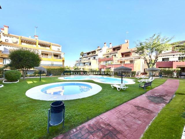 Magnífico apartamento con jardín y acceso directo a la piscina en Costa Esuri photo 0