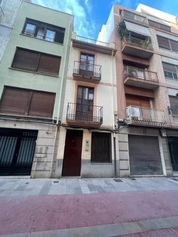 Casa unifamiliar adosada para reformar en el centro de Castellón photo 0