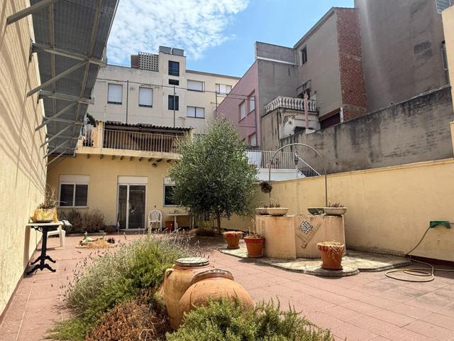 CASA EN C-GRACIA CON MARAVILLOSO PATIO EN SABADELL. photo 0