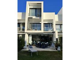 CASA ADOSADA MODERNA EN PRIMERA LINEA DEL GOLF photo 0