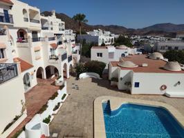 Dúplex con trastero en residencial con piscina con espectaculares vistas a la bahía photo 0