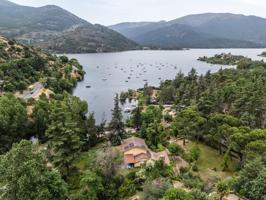 ^LA CASA DEL LAGO^ ESPECTACULAR CHALET CON ACCESO A PLAYA EN EL PANTANO DEL BURGUILLO. UBICACIÓN ÚNICA CON LOS MEJORES ATARDECERES DE LA ZONA^ Exclusivo chalet de más de 3.000 m² de parcela situa photo 0