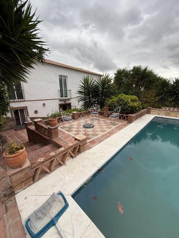 Casa En venta en Coín photo 0