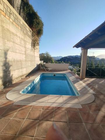 Villa En venta en Coín photo 0