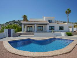 Villa En venta en Moraira photo 0