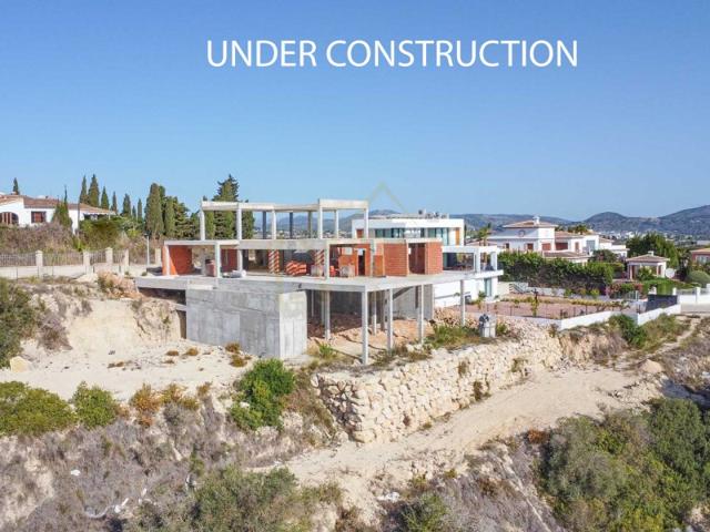 Villa En venta en Moraira photo 0
