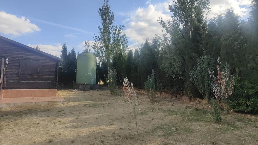 TERRENO CON CASA DE MADERA photo 0