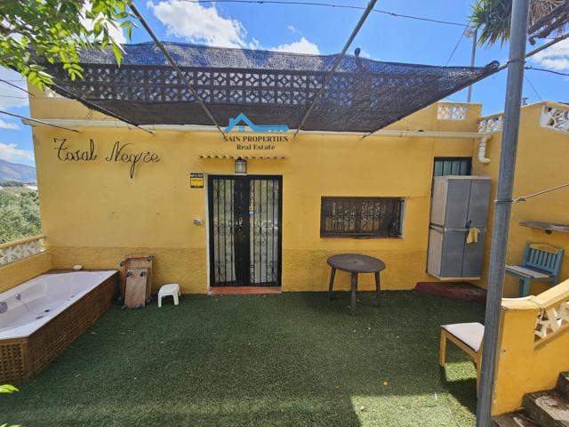Coqueta casa de campo con terreno en La Nucia photo 0